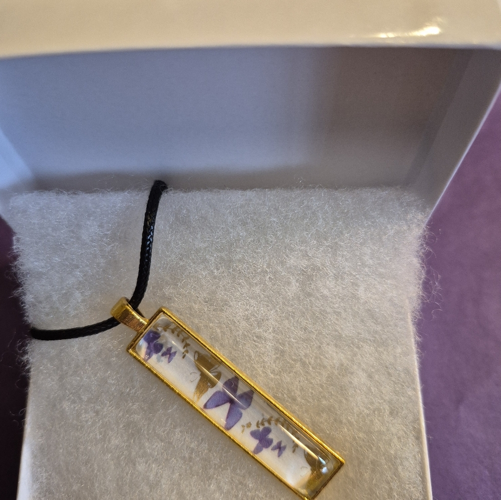 Gold and Purple Bar Necklace with Gemstone Accents